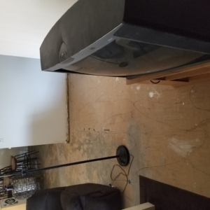 BEFORE:  VCT Black Mastic Asbestos Abatement in Living Room - Scottsdale, AZ