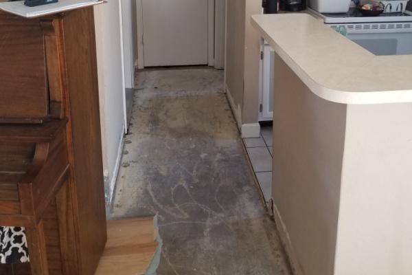 Flood Repair and Floor Replacement-BEFORE hall floor-Mesa AZ-Arizona Total Home Restoration-600x400